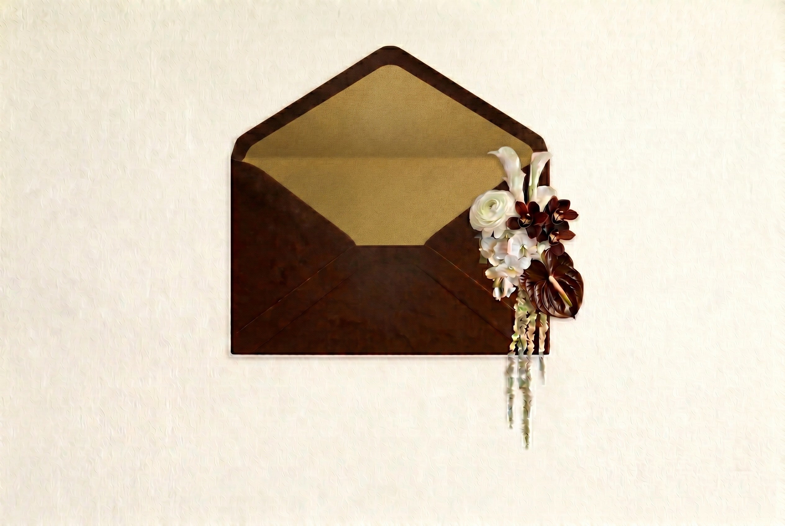 The same envelope, now open, revealing a gold liner